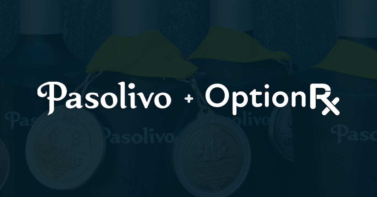 Photo showcasing the TroyRx branded blue with Pasolivo's award-winning olive oils with their medals in the background. The logo for both Pasolivo and OptionRx are displayed.